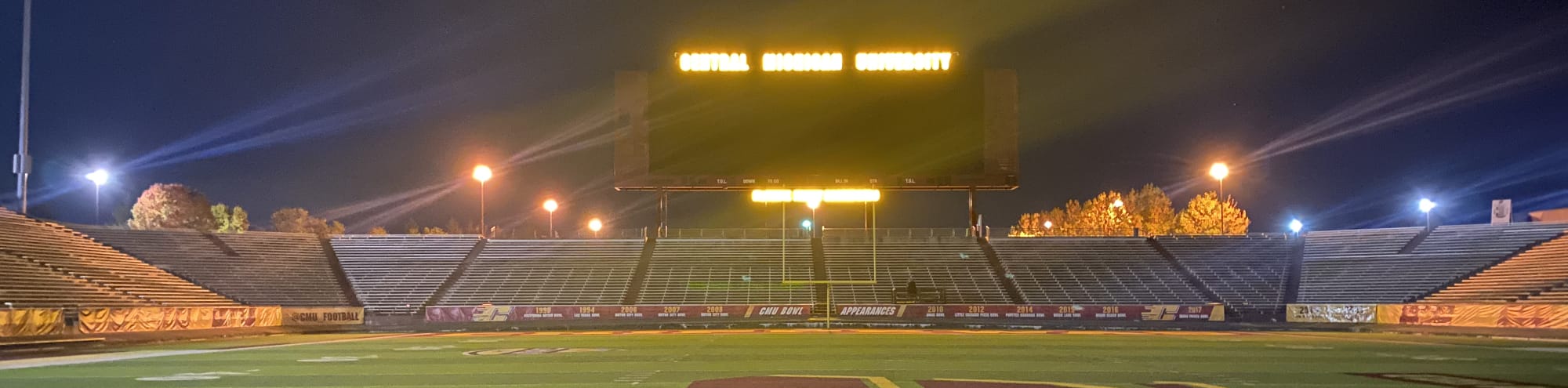 empty football stadium at night under the lights Miami